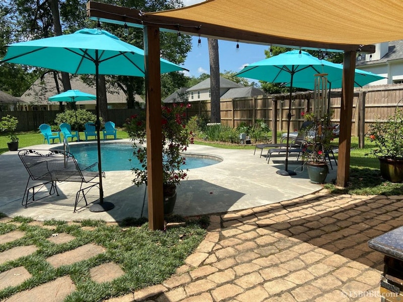 NEW LISTING! Beautiful updated home with pool and outdoor kitchen. Must