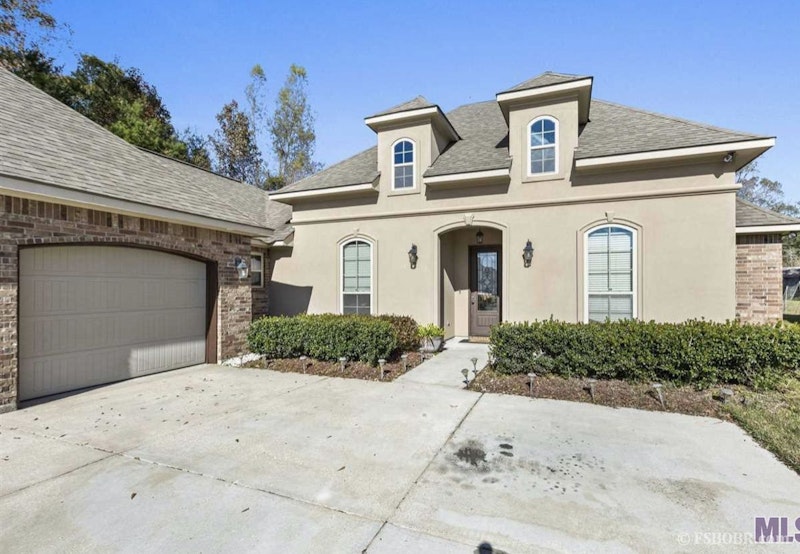 Don’t miss this home with a pool and batting cage 24939 Plantation