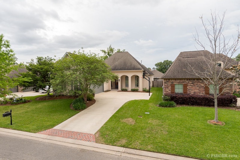 Designer Home featuring Abundant Stone Accents 16157 Woodland Trail, Baton Rouge LA